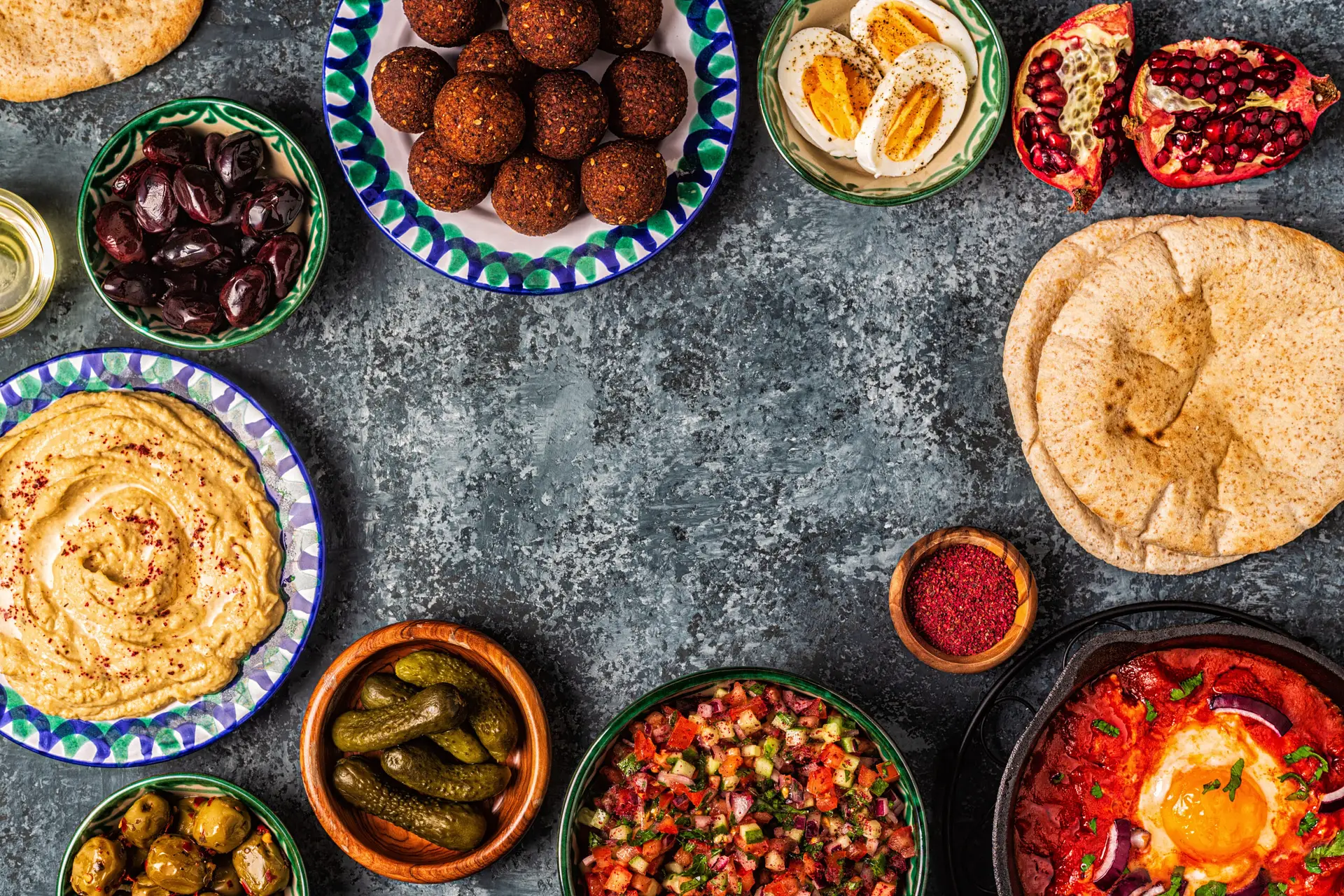 Falafel, hummus, shakshuka, Israeli salad – traditional dishes o Falafel, hummus, shakshuka, Israeli salad - traditional dishes of Israeli cuisine. top view.