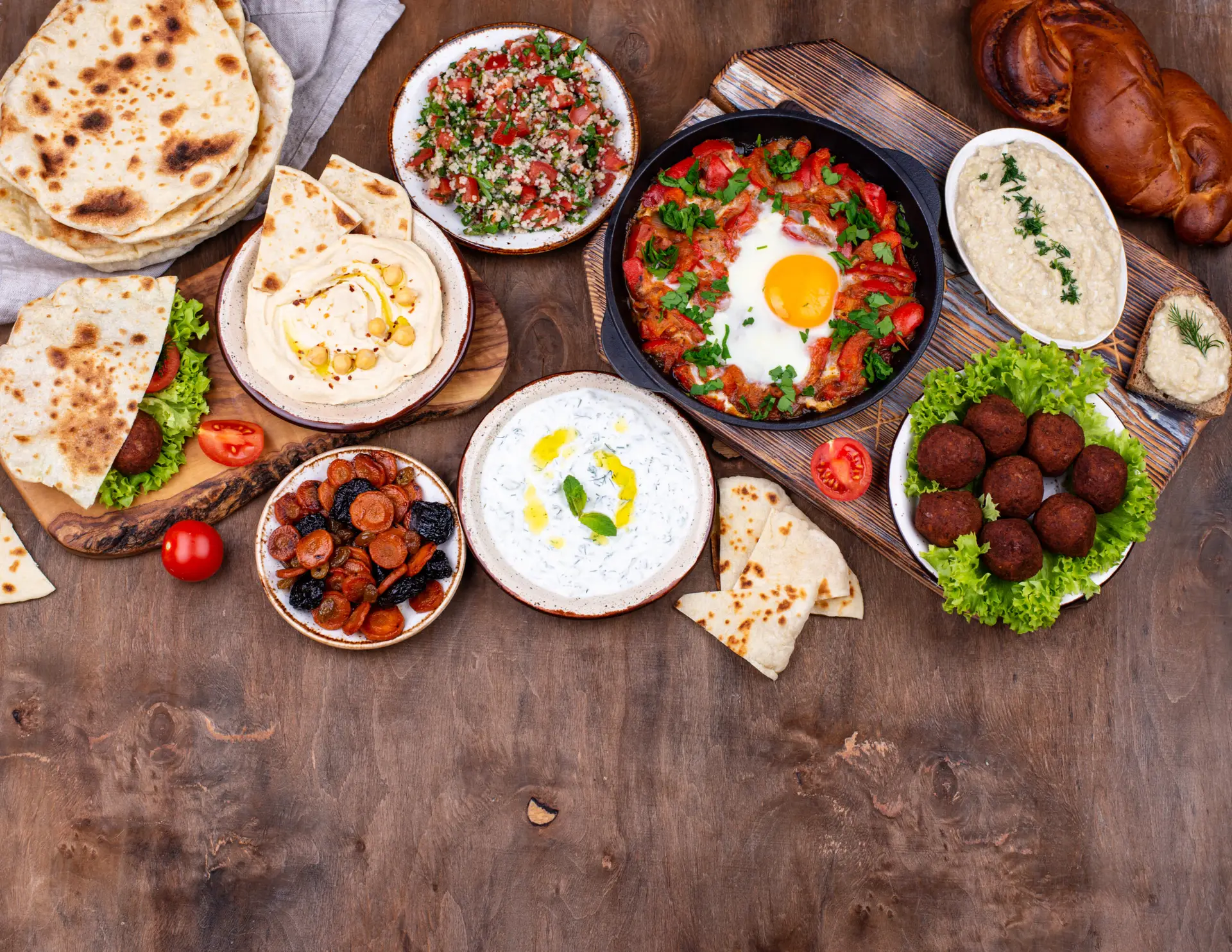 Traditional Jewish, Israeli and middle Eastern food Traditional Jewish food. Hummus, falafel, shakshuka, tsimes, forshmak and pita
