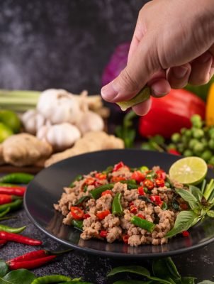 stir-fried-pork-basil-on-banana-leaves-in-a-black-2025-01-16-13-59-15-utc.jpg stir-fried-pork-basil-on-banana-leaves-in-a-black-2025-01-16-13-59-15-utc.jpg